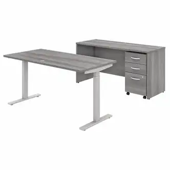 Bush Business Furniture Studio C 60W Height Adjustable Standing Desk With Credenza And File Cabinet - 60" x 24" Credenza, 60" x 30"46.7" Desk - 3 x File, Box Drawer(s) - Finish: Platinum Gray, Thermofused Laminate (TFL)